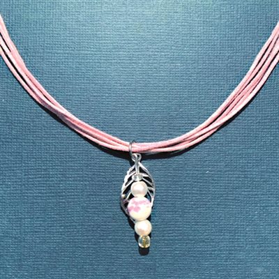 Corded Pink Necklace With Charms